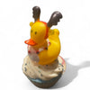 Yellow rubber duck with orange beak and brown Deeley boppers