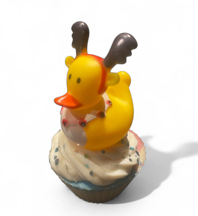 Yellow rubber duck with orange beak and brown Deeley boppers