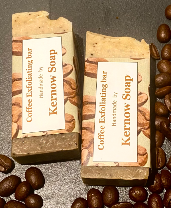 two labelled half bars of Kernow Soap Coffee exfoliating.