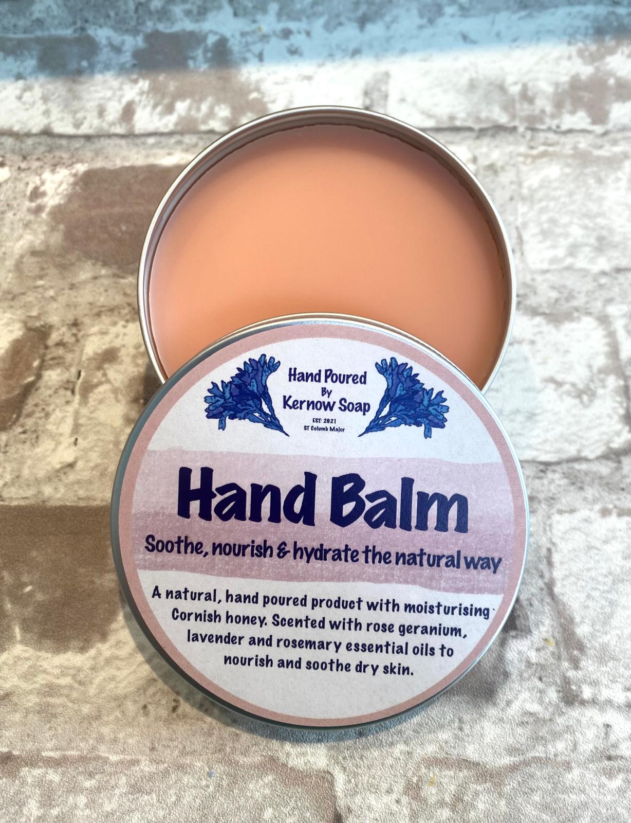 An open Kernow Soap tin container of Hand Balm with a label that includes the product name.