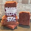 Stack of Kernow Soap Rosehip soap bars with a decorative with labels. 
